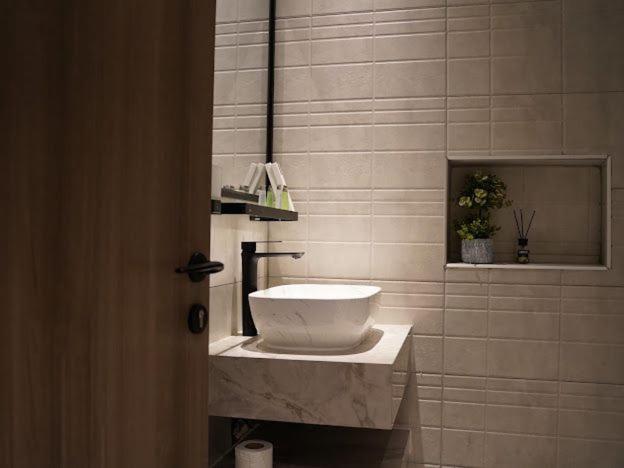 Lavenue Resthouse Apartment นิซวา ห้อง รูปภาพ