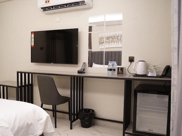 Lavenue Resthouse Apartment นิซวา ห้อง รูปภาพ